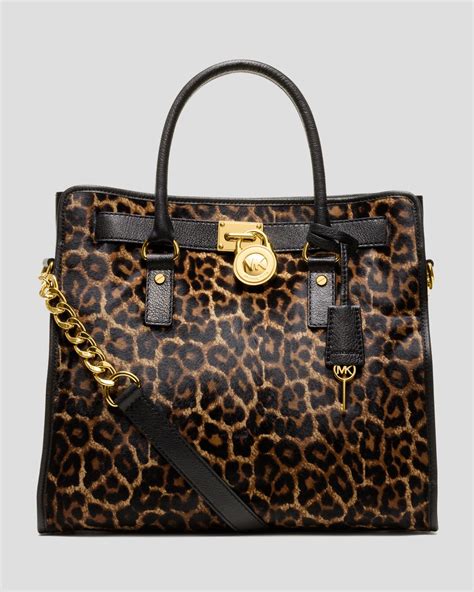 michael kors animal print wallet|michael kors cheetah print handbags.